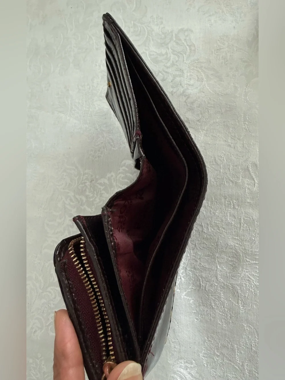 Michael Kors Burgundy patent bifold wallet with Gold Studs